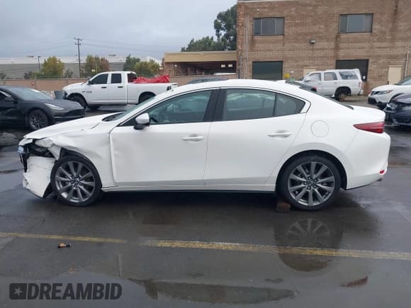 ✅ 2019 Mazda 3 Premium • VIN: 3MZBPAEM0KM101610 • Лот: 43720257. Опубликован ранее на IAAI с пробегом Не указан. Бесплатный доступ к архиву аукционных продаж из США и подробный отчёт об истории автомобиля на DreamBid. Изображение 14.