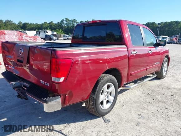 ✅ 2005 Nissan Titan LE • VIN: 1N6BA07A05N572097 • Lot: 43145942. Wystawiony na IAAI z przebiegiem 219 076 mil. Bezpłatny archiwum sprzedaży aukcyjnych z USA i szczegółowy raport historii pojazdu na DreamBid. Zdjęcie 4.