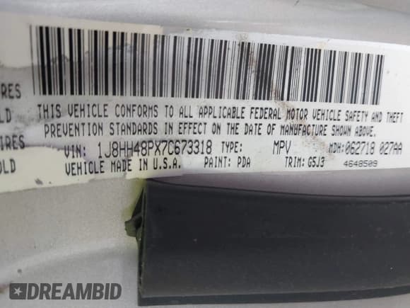✅ 2007 Jeep Commander Sport • VIN: 1J8HH48PX7C673318 • Lot: 41585570. Wystawiony na IAAI z przebiegiem 188 977 mil. Bezpłatny archiwum sprzedaży aukcyjnych z USA i szczegółowy raport historii pojazdu na DreamBid. Zdjęcie 9.