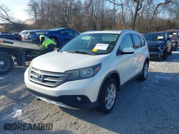 ✅ 2012 Honda CR-V EX-L • VIN: 5J6RM4H74CL062387 • Лот: 43894935. Опубликован ранее на IAAI с пробегом 219 063 миль. Бесплатный доступ к архиву аукционных продаж из США и подробный отчёт об истории автомобиля на DreamBid. Изображение 2.