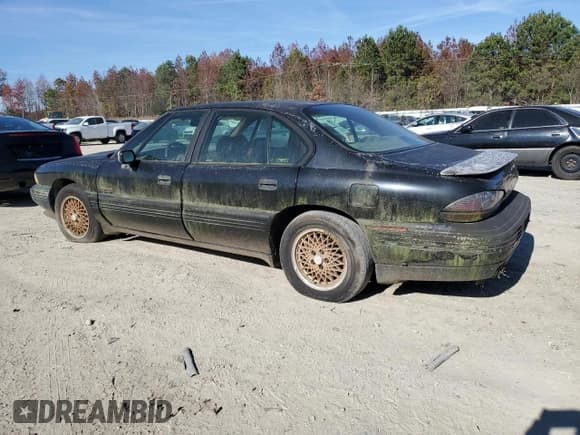 ✅ 1993 Pontiac Bonneville SSE • VIN: 1G2HZ52LXP1287420 • Лот: 82290094. Опубликован ранее на Copart с пробегом Не указан. Бесплатный доступ к архиву аукционных продаж из США и подробный отчёт об истории автомобиля на DreamBid. Изображение 2.