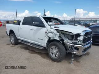 ✅ 2022 Ram 2500 Big Horn • VIN: 3C6UR5DJ4NG119915 • Lot: 42206890. Listed on IAAI with 77,269 mi. Free auction sales archive from the USA and detailed vehicle history report at DreamBid. Image 1.