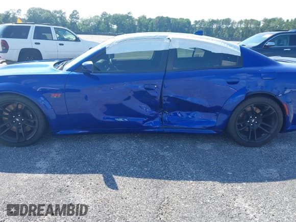 ✅ 2022 Dodge Charger Scat Pack Widebody • VIN: 2C3CDXGJ0NH176255 • Lot: 39576763. Wystawiony na IAAI z przebiegiem 18 324 mil. Bezpłatny archiwum sprzedaży aukcyjnych z USA i szczegółowy raport historii pojazdu na DreamBid. Zdjęcie 14.