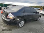 ✅ 2009 Kia Spectra EX • VIN: KNAFE221095634242 • Лот: 84546585. Опубликован ранее на Copart с пробегом 117 203 миль. Бесплатный доступ к архиву аукционных продаж из США и подробный отчёт об истории автомобиля на DreamBid. Изображение 3.