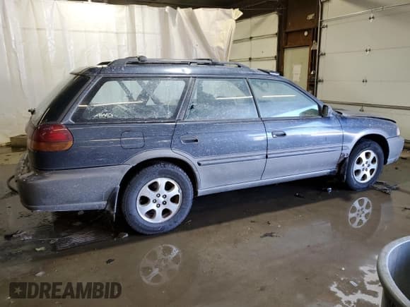 ✅ 1999 Subaru Legacy Outback • VIN: 4S3BG6859X7646243 • Lot: 87373234. Listed on Copart with 158,565 mi. Free auction sales archive from the USA and detailed vehicle history report at DreamBid. Image 3.