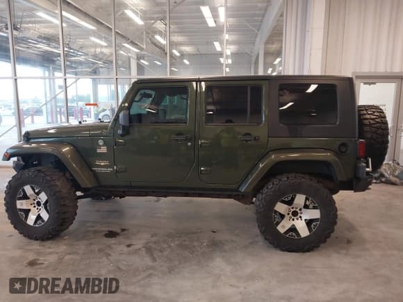 ✅ 2008 Jeep Wrangler Unlimited Sahara • VIN: 1J4GA59158L504309 • Lot: 43292936. Listed on IAAI with 147,545 mi. Free auction sales archive from the USA and detailed vehicle history report at DreamBid. Image 15.
