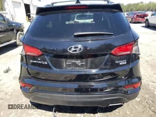 ✅ 2017 Hyundai Santa Fe 2.4L • VIN: 5NMZUDLB9HH016693 • Лот: 44305503. Опубликован ранее на Copart с пробегом 103 611 миль. Бесплатный доступ к архиву аукционных продаж из США и подробный отчёт об истории автомобиля на DreamBid. Изображение 6.
