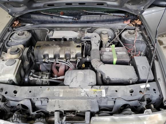 1998 Saturn SL z VIN 1G8ZF5285WZ204569, wystawiony jako Copart lot #43624765 z przebiegiem 318 544 mil mil oraz Szkoda całkowita • Salvage title. Historia ofert i sprzedaży dostępna na DreamBid. Obrazek 13.