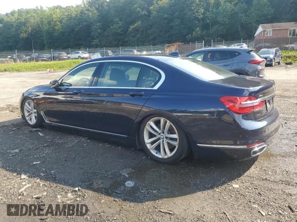 ✅ 2016 BMW 7 Series 750i xDrive • VIN: WBA7F2C54GG418169 • Lot: 69244195. Listed on Copart with 100,392 mi. Free auction sales archive from the USA and detailed vehicle history report at DreamBid. Image 2.