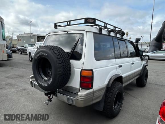 ✅ 1997 Mitsubishi Montero • VIN: JA4MR41R3VJ007919 • Lot: 51544685. Listed on Copart with 268,046 mi. Free auction sales archive from the USA and detailed vehicle history report at DreamBid. Image 4.