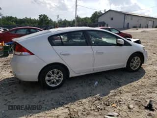 ✅ 2010 Honda Insight EX • VIN: JHMZE2H77AS026136 • Лот: 62879054. Опубликован ранее на Copart с пробегом 132 823 миль. Бесплатный доступ к архиву аукционных продаж из США и подробный отчёт об истории автомобиля на DreamBid. Изображение 3.
