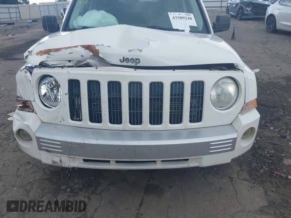✅ 2007 Jeep Patriot Limited • VIN: 1J8FT48W47D401631 • Lot: 43309240. Listed on IAAI with 148,523 mi. Free auction sales archive from the USA and detailed vehicle history report at DreamBid. Image 6.