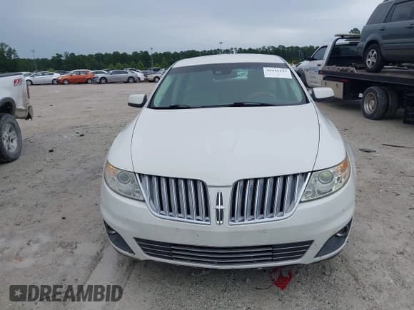 ✅ 2010 Lincoln MKS • VIN: 1LNHL9DR2AG609912 • Лот: 42946192. Опубликован ранее на IAAI с пробегом 196 901 миль. Бесплатный доступ к архиву аукционных продаж из США и подробный отчёт об истории автомобиля на DreamBid. Изображение 6.