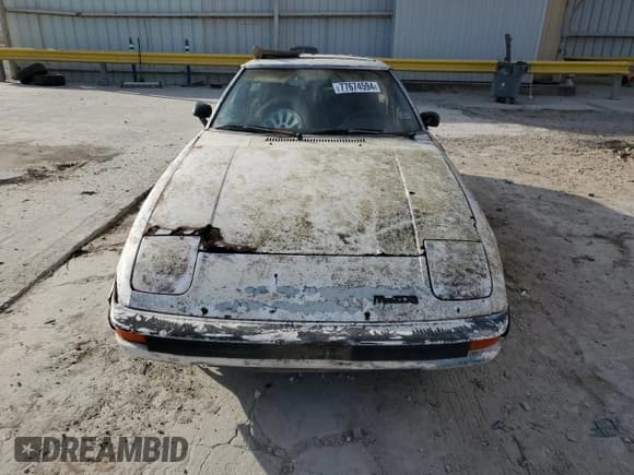 ✅ 1985 Mazda RX-7 • VIN: JM1FB3322F0860235 • Lot: 77674594. Wystawiony na Copart z przebiegiem 112 945 mil. Bezpłatny archiwum sprzedaży aukcyjnych z USA i szczegółowy raport historii pojazdu na DreamBid. Zdjęcie 5.