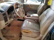 ✅ 2004 Infiniti QX56 • VIN: 5N3AA08C34N808354 • Lot: 63601335. Listed on Copart with Not provided. Free auction sales archive from the USA and detailed vehicle history report at DreamBid. Image 7.