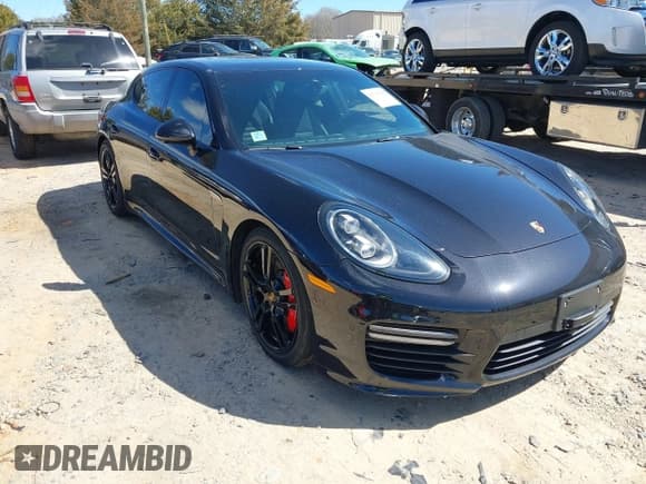 ✅ 2014 Porsche Panamera GTS • VIN: WP0AF2A7XEL083453 • Lot: 41735250. Listed on IAAI with 57,695 mi. Free auction sales archive from the USA and detailed vehicle history report at DreamBid. Image 1.