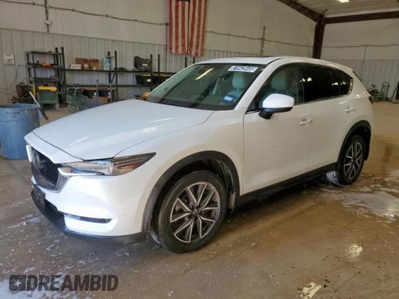 ✅ 2018 Mazda CX-5 Grand Touring • VIN: JM3KFBDM7J0344272 • Лот: 81642645. Опубликован ранее на Copart с пробегом 80 955 миль. Бесплатный доступ к архиву аукционных продаж из США и подробный отчёт об истории автомобиля на DreamBid. Изображение 1.