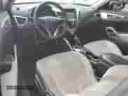 2013 Hyundai Veloster w/Gray Int с VIN KMHTC6AD0DU167414, выставлен на аукционе Copart как лот 73476894 с пробегом 119 928 миль миль и Списание • Salvage title. История ставок и продаж доступна на DreamBid. Изображение 8.