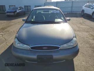 ✅ 1998 Ford Contour LX • VIN: 1FAFP66L5WK236964 • Лот: 46866675. Опубликован ранее на Copart с пробегом 91 107 миль. Бесплатный доступ к архиву аукционных продаж из США и подробный отчёт об истории автомобиля на DreamBid. Изображение 5.