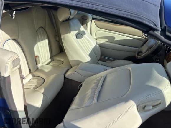 ✅ 2005 Jaguar XK XK8 • VIN: SAJDA42C852A42154 • Лот: 82352994. Опубликован ранее на Copart с пробегом 75 184 миль. Бесплатный доступ к архиву аукционных продаж из США и подробный отчёт об истории автомобиля на DreamBid. Изображение 6.