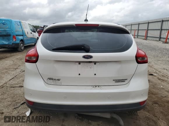 ✅ 2016 Ford Focus Titanium • VIN: 1FADP3N27GL242243 • Лот: 90424575. Опубликован ранее на Copart с пробегом 58 813 миль. Бесплатный доступ к архиву аукционных продаж из США и подробный отчёт об истории автомобиля на DreamBid. Изображение 6.
