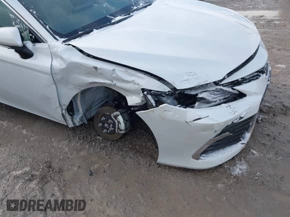 2022 Toyota Camry Hybrid XLE with VIN 4T1F31AK8NU575434, listed as a IAAI auction lot 41067498 with 11,052 mi miles and . Bid and sale history available at DreamBid. Image 6.