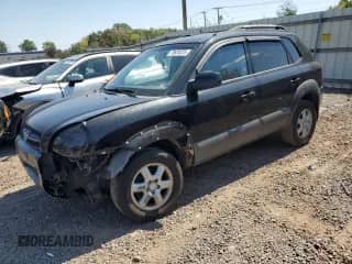2005 Hyundai Tucson GLS with VIN KM8JN12D05U080357, listed as a Copart auction lot 70626225 with 177,564 mi miles and Salvage title. Bid and sale history available at DreamBid. Image 1.