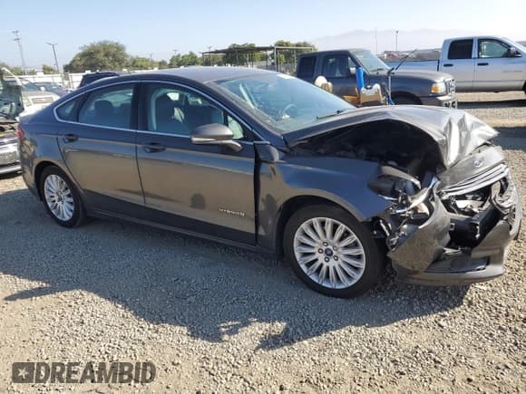 ✅ 2015 Ford Fusion SE Hybrid • VIN: 3FA6P0LU8FR214186 • Lot: 90095625. Listed on Copart with 165,926 mi. Free auction sales archive from the USA and detailed vehicle history report at DreamBid. Image 4.
