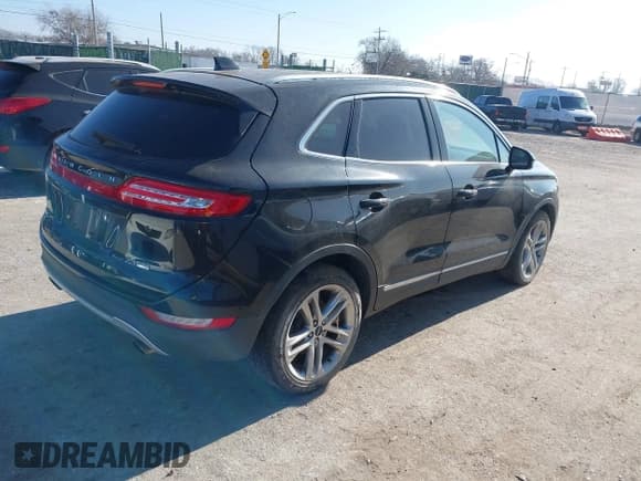 ✅ 2015 Lincoln MKC • VIN: 5LMTJ2AH9FUJ33442 • Lot: 43869684. Listed on IAAI with 106,928 mi. Free auction sales archive from the USA and detailed vehicle history report at DreamBid. Image 4.
