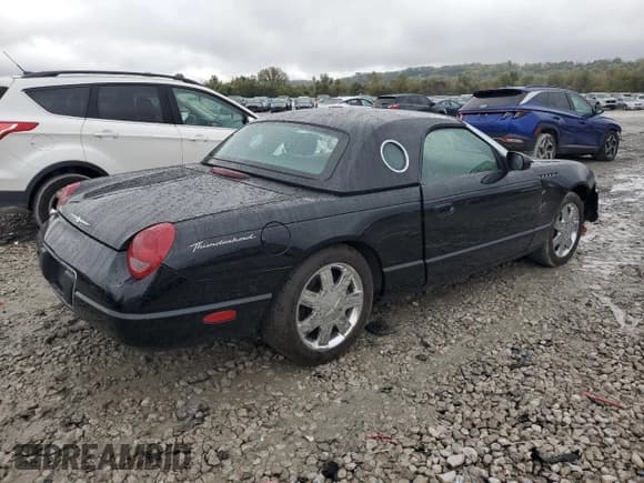 ✅ 2002 Ford Thunderbird Hardtop Premium • VIN: 1FAHP60A52Y119814 • Lot: 82621765. Wystawiony na Copart z przebiegiem Nie podano. Bezpłatny archiwum sprzedaży aukcyjnych z USA i szczegółowy raport historii pojazdu na DreamBid. Zdjęcie 3.