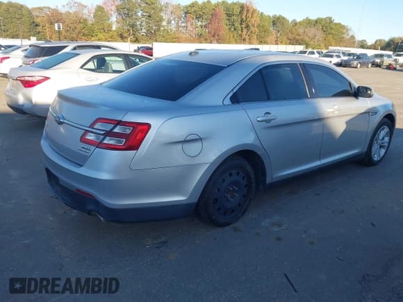 ✅ 2015 Ford Taurus SEL • VIN: 1FAHP2E81FG192544 • Лот: 43713829. Опубликован ранее на IAAI с пробегом 246 635 миль. Бесплатный доступ к архиву аукционных продаж из США и подробный отчёт об истории автомобиля на DreamBid. Изображение 4.