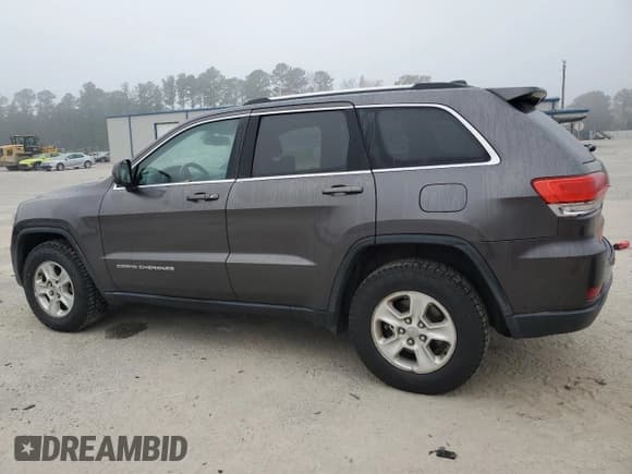 ✅ 2015 Jeep Grand Cherokee Laredo • VIN: 1C4RJEAG5FC700519 • Lot: 93738715. Wystawiony na Copart z przebiegiem 143 110 mil. Bezpłatny archiwum sprzedaży aukcyjnych z USA i szczegółowy raport historii pojazdu na DreamBid. Zdjęcie 2.