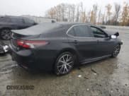 ✅ 2022 Toyota Camry Hybrid Nightshade • VIN: 4T1G31AK2NU576504 • Лот: 91945085. Опубликован ранее на Copart с пробегом 159 295 миль. Бесплатный доступ к архиву аукционных продаж из США и подробный отчёт об истории автомобиля на DreamBid. Изображение 3.