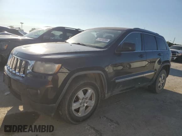 ✅ 2012 Jeep Grand Cherokee Laredo • VIN: 1C4RJFAG2CC128956 • Лот: 71070205. Опубликован ранее на Copart с пробегом 134 835 миль. Бесплатный доступ к архиву аукционных продаж из США и подробный отчёт об истории автомобиля на DreamBid. Изображение 1.