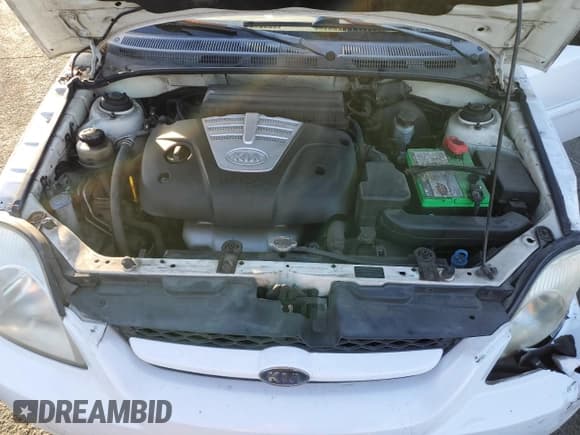 ✅ 2005 Kia Rio • VIN: KNADC125656373469 • Lot: 78943144. Listed on Copart with 88,398 mi. Free auction sales archive from the USA and detailed vehicle history report at DreamBid. Image 11.