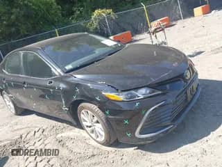 2022 Toyota Camry LE with VIN 4T1C11BK4NU051561, listed as a IAAI auction lot 43171630 with 34,336 mi miles and . Bid and sale history available at DreamBid. Image 1.