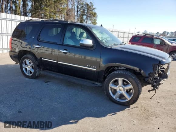✅ 2012 Chevrolet Tahoe LTZ • VIN: 1GNSCCE01CR276608 • Lot: 88820715. Listed on Copart with 112,976 mi. Free auction sales archive from the USA and detailed vehicle history report at DreamBid. Image 4.