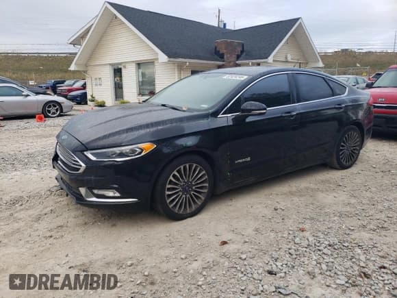 ✅ 2017 Ford Fusion Hybrid Titanium • VIN: 3FA6P0RU7HR278472 • Lot: 82434245. Wystawiony na Copart z przebiegiem 144 287 mil. Bezpłatny archiwum sprzedaży aukcyjnych z USA i szczegółowy raport historii pojazdu na DreamBid. Zdjęcie 1.