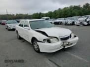 ✅ 2000 Mazda 626 LX • VIN: 1YVGF22CXY5112958 • Lot: 72740904. Listed on Copart with 111,581 mi. Free auction sales archive from the USA and detailed vehicle history report at DreamBid. Image 11.