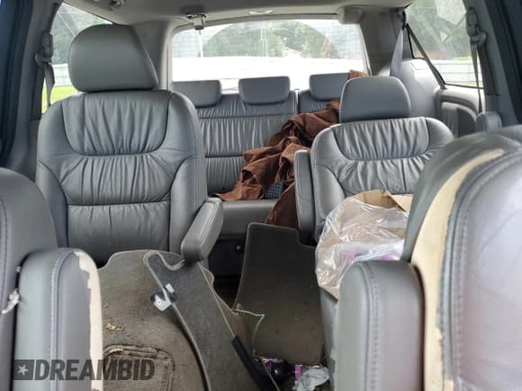 ✅ 2009 Honda Odyssey EX-L • VIN: 5FNRL38739B018122 • Лот: 70108105. Опубликован ранее на Copart с пробегом 237 839 миль. Бесплатный доступ к архиву аукционных продаж из США и подробный отчёт об истории автомобиля на DreamBid. Изображение 10.