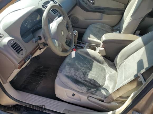 2005 Chevrolet Malibu LS z VIN 1G1ZT52825F231915, wystawiony jako Copart lot #77002194 z przebiegiem 327 023 mil mil oraz Szkoda całkowita • Salvage title. Historia ofert i sprzedaży dostępna na DreamBid. Obrazek 7.