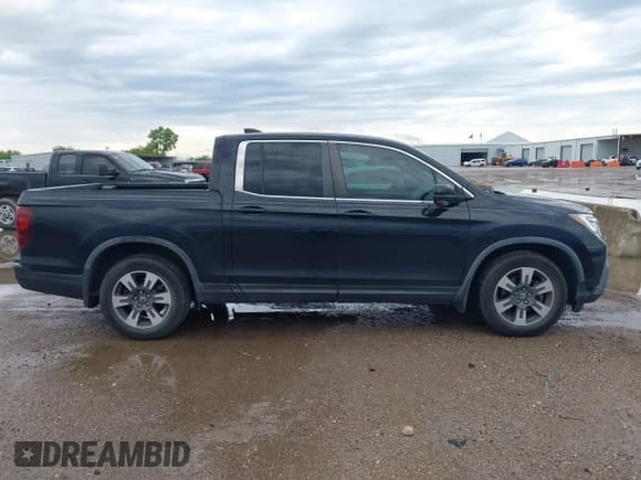 ✅ 2017 Honda Ridgeline RTL-T • VIN: 5FPYK2F64HB003542 • Lot: 42171243. Listed on IAAI with 102,071 mi. Free auction sales archive from the USA and detailed vehicle history report at DreamBid. Image 13.