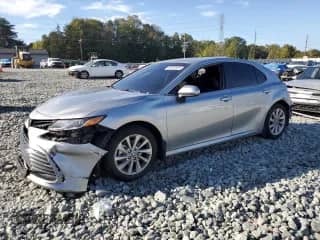 2023 Toyota Camry LE с VIN 4T1C11AK1PU121943, выставлен на аукционе Copart как лот 82264925 с пробегом 56 723 миль миль и Списание • Salvage title. История ставок и продаж доступна на DreamBid. Изображение 1.