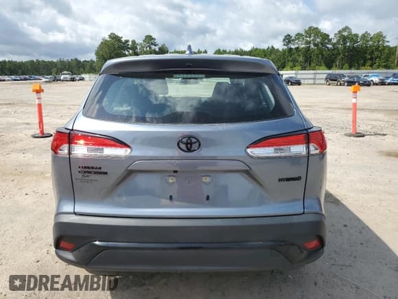 ✅ 2023 Toyota Corolla Cross Hybrid S • VIN: 7MUFBABG3PV007025 • Lot: 67219255. Wystawiony na Copart z przebiegiem 19 215 mil. Bezpłatny archiwum sprzedaży aukcyjnych z USA i szczegółowy raport historii pojazdu na DreamBid. Zdjęcie 6.