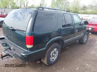 ✅ 2004 Chevrolet Blazer LS • VIN: 1GNDT13X24K107558 • Lot: 42124715. Wystawiony na IAAI z przebiegiem 80 843 mil. Bezpłatny archiwum sprzedaży aukcyjnych z USA i szczegółowy raport historii pojazdu na DreamBid. Zdjęcie 4.