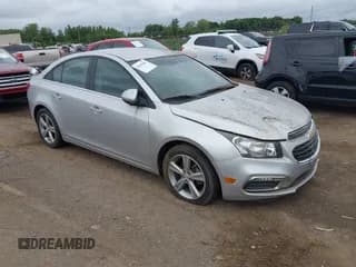 ✅ 2015 Chevrolet Cruze LT • VIN: 1G1PE5SB7F7136372 • Lot: 43045086. Listed on IAAI with 117,073 mi. Free auction sales archive from the USA and detailed vehicle history report at DreamBid. Image 1.