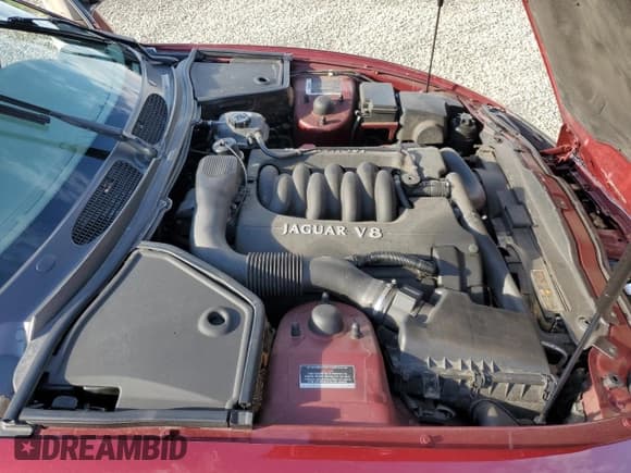 ✅ 1998 Jaguar XK • VIN: SAJGX5248WC026345 • Лот: 74533144. Опубликован ранее на Copart с пробегом Не указан. Бесплатный доступ к архиву аукционных продаж из США и подробный отчёт об истории автомобиля на DreamBid. Изображение 11.