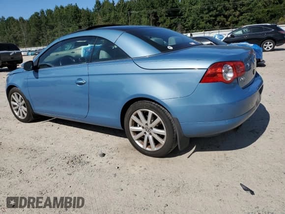 ✅ 2009 Volkswagen Eos Komfort • VIN: WVWBA71F49V022715 • Lot: 81041715. Listed on Copart with 92,082 mi. Free auction sales archive from the USA and detailed vehicle history report at DreamBid. Image 2.