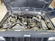 ✅ 1999 Jeep Cherokee Limited • VIN: 1J4FF78S1XL591580 • Lot: 92581565. Listed on Copart with 173,128 mi. Free auction sales archive from the USA and detailed vehicle history report at DreamBid. Image 11.