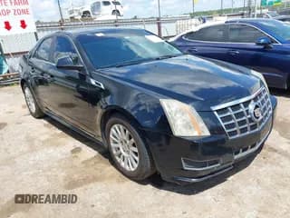 ✅ 2013 Cadillac CTS Luxury • VIN: 1G6DE5E59D0100837 • Lot: 42574781. Listed on IAAI with 167,271 mi. Free auction sales archive from the USA and detailed vehicle history report at DreamBid. Image 1.
